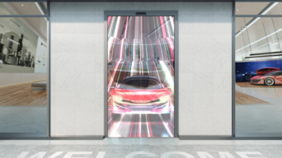 An image of a car showroom which uses LG signage on its entrance door, which can be experienced during the virtual tour
