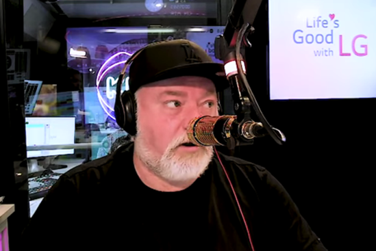 Kyle Sandilands, the host of KIIS FM, presenting a surprise giveback radio segment for families affected by the floods