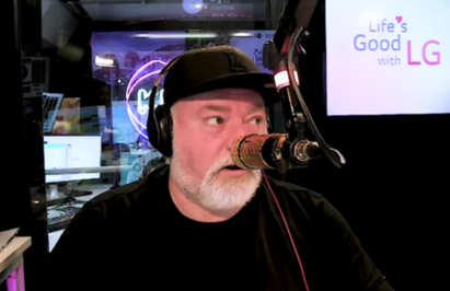 Kyle Sandilands, the host of KIIS FM, presenting a surprise giveback radio segment for families affected by the floods