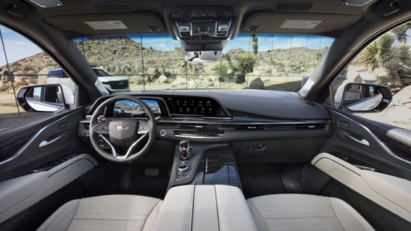 An image showing the front interior design of a Cadillac with LG’s infotainment system on show