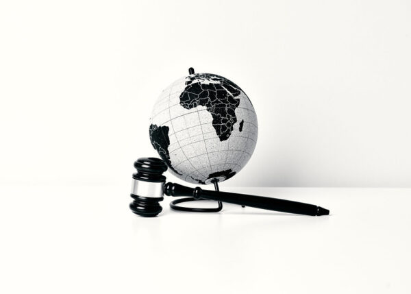 An image of a judge hammer and a globe depicting that LG is taking a firm stance on patent infringement