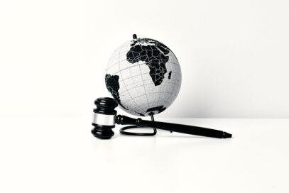An image of a judge hammer and a globe depicting that LG is taking a firm stance on patent infringement