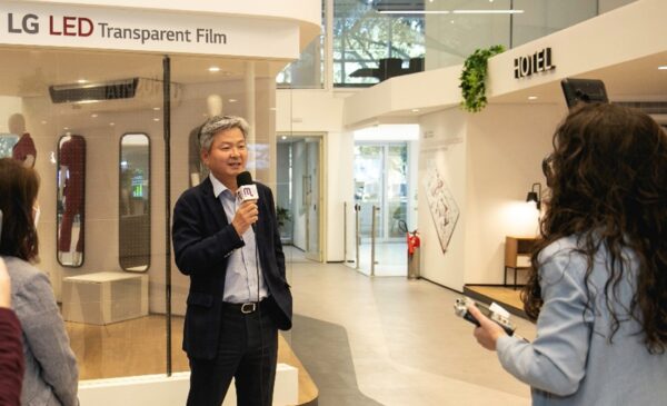 Julio Baek, president of LG Electronics Brazil, giving a speech on camera at The LG Business Solution Center in Brazil.