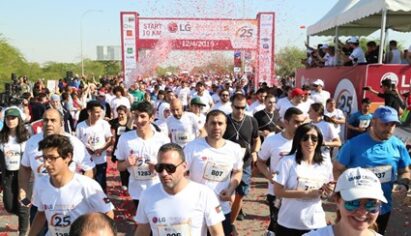 Hundreds of runners crossing the start line at the 2019 LG Dead Sea Half Marathon