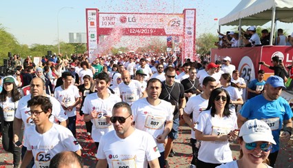 Hundreds of runners crossing the start line at the 2019 LG Dead Sea Half Marathon