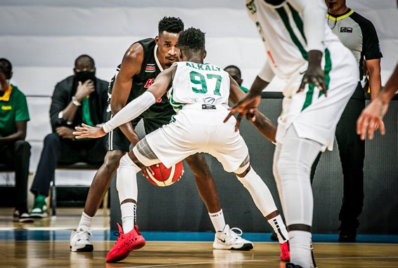 Tylor Okari Ongwae being guarded during a national basketball game