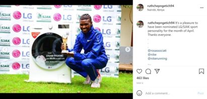 An Instagram post by Ruth Chepng’etich with a picture of her holding the trophy next to an LG washer