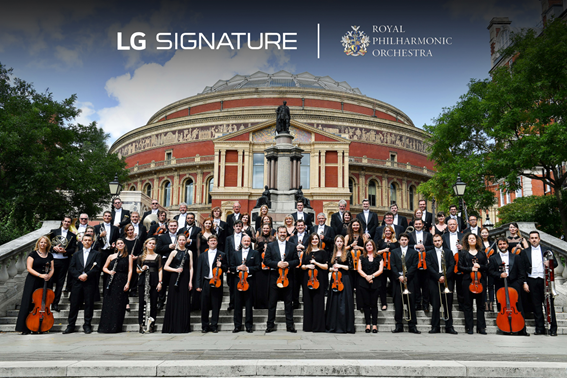  The Royal Philharmonic Orchestra posing outside the Royal Albert Hall with the logos of LG SIGNATURE and the orchestra above