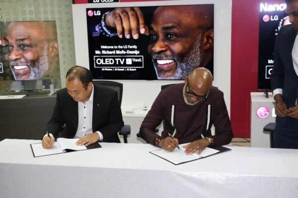 Richard Mofe-Damijo signing up to be LG’s newest ambassador.