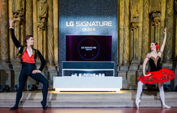 A photo taken during the launch of LG OLED R at the Pushkin Museum with two ballet dancers performing in front of the groundbreaking TV