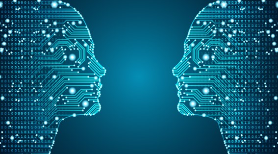 Two circuit patterns resembling two human heads face-to-face to represent artificial intelligence. 