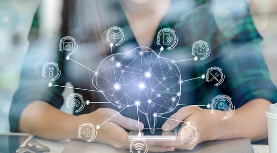 Human-AI Relationship 07 An illustration of a human brain surrounded by several icons, with a woman using her smartphone in the background.