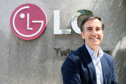 Carlos Olave, LG Global HR Leader, posing in front of the LG logo outside LG Twin Towers in Seoul.