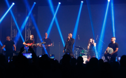 Israeli singer Itay Levi performing with his band at the LG OLED TV launch event