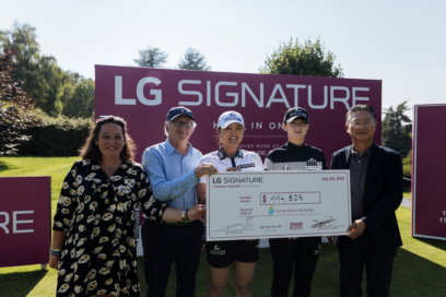 Justine Buisson, Franck Riboud, Ko Jin-young, Park Sung-hyun and Heaven Lee pose with a large check during the golf event to support online charity auction, 