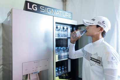 Professional golfer Park Sung-hyun drinking a bottle of water from LG SIGNATURE Refrigerator.