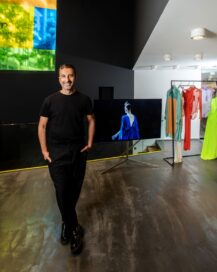 Designer Stelios Koudounaris pictured with LG G1 OLED at his showroom