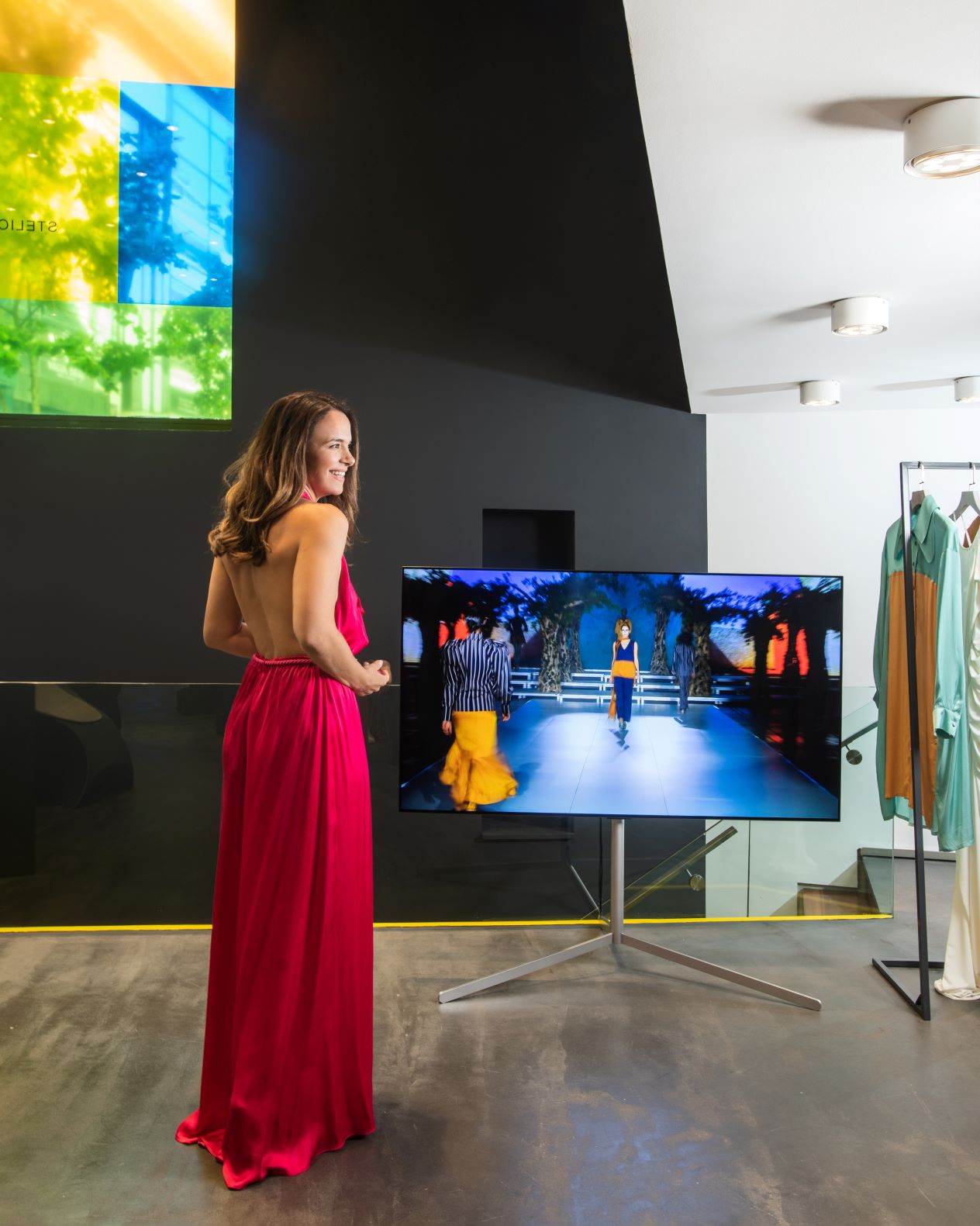 Influencer Eliana Chrysikopoulou pictured with LG G1 OLED at Koudounaris’s showroom