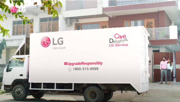 A large LG Care Delight service truck paying a visit to a customer's home. 
