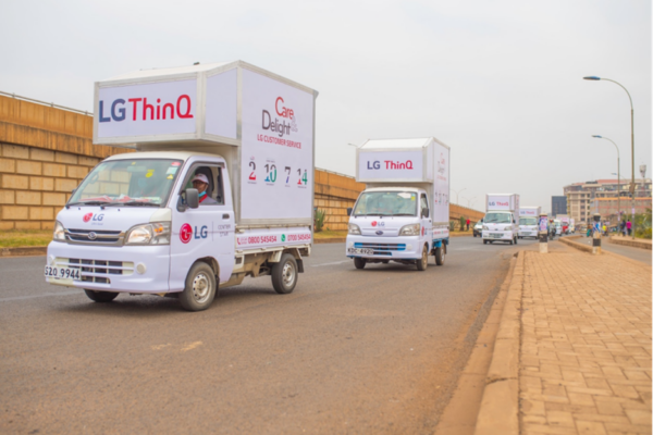 LG trucks riding in a convoy for The Last Mile program which provides appliance repair services.