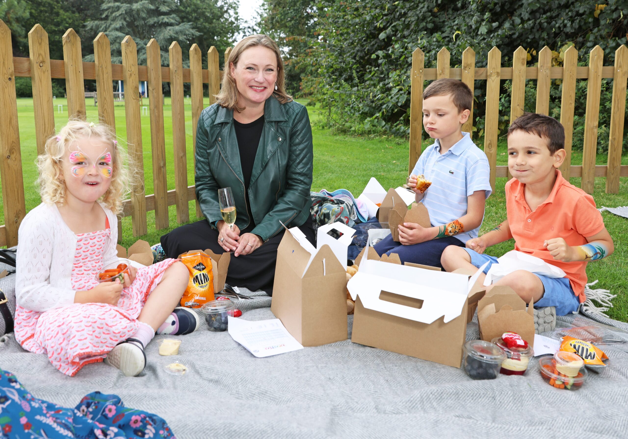 Jess and the kids enjoying a picnic lunch.