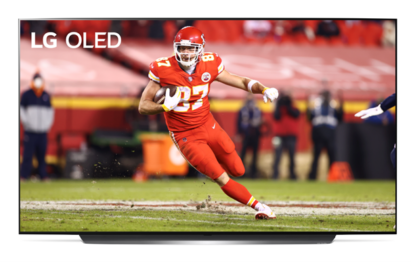 Image of Travis Kelce of the Kansas City Chiefs running the ball during a game displayed on LG OLED TV.