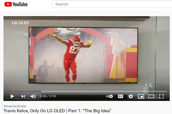 A screenshot from LG’s YouTube video featuring Kansas City Chiefs’ Travis Kelce dancing as he enters the field.