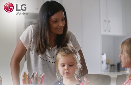 A woman talking with two little girls.