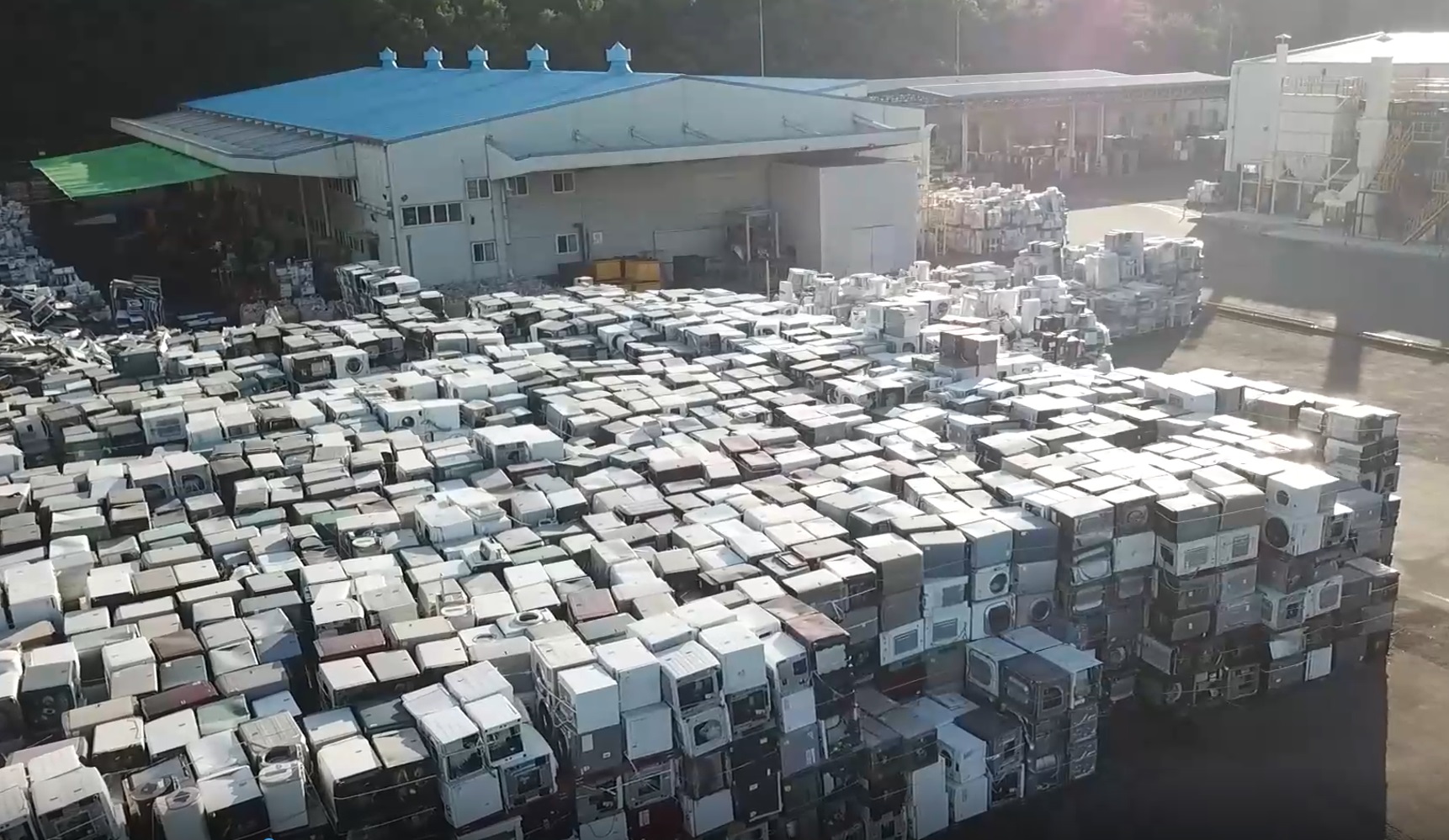 E-waste piled up outside the LG Chilseo Recycling Center.