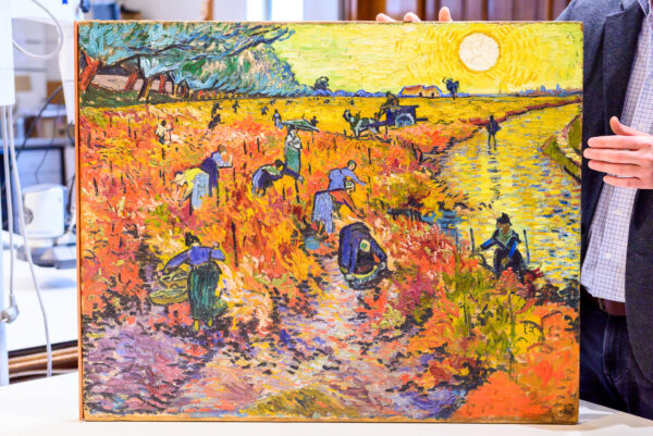 “The Red Vineyards at Arles” painting by Vincent Van Gogh. 