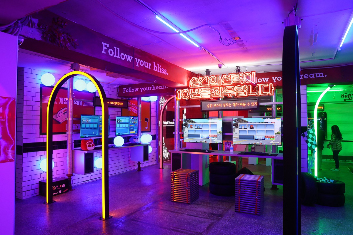 Inside the Gold Star Arcade fully equipped with various LG electronic devices.
