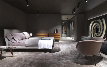The interior of the Molteni&C flagship store in Paris where LG OLED TV harmonizes with luxurious bedroom furniture.