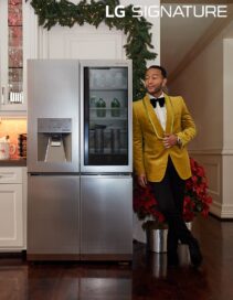 An image of John Legend leaning against LG SIGNATURE Refrigerator