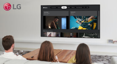 Three people in a living room browsing through the Apple Music library on LG’s big-screen TVand.