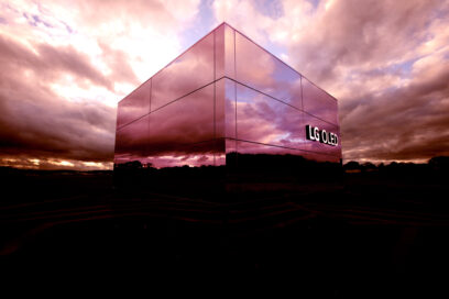 LG OLED logo on glass building at Dunsfold Aerodrome in Surrey Hills, UK.