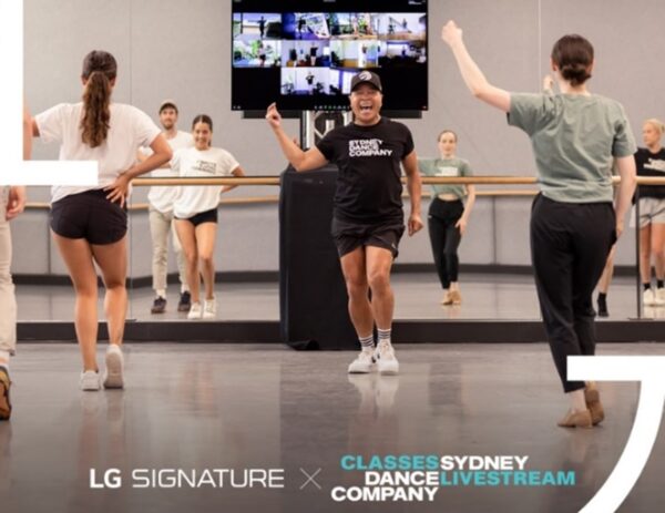 Performers of the Sydney Dance Company practicing in the studio.