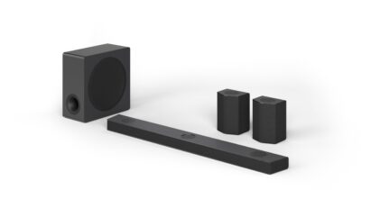 The LG Soundbar S95QR model with two rear speakers and a subwoofer.