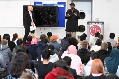 Emile Heskey, the English football legend, inspiring students at their school during assembly.