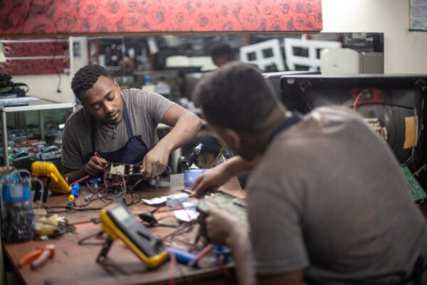 A student from LG-KOICA Hope TVET College repairing an appliance