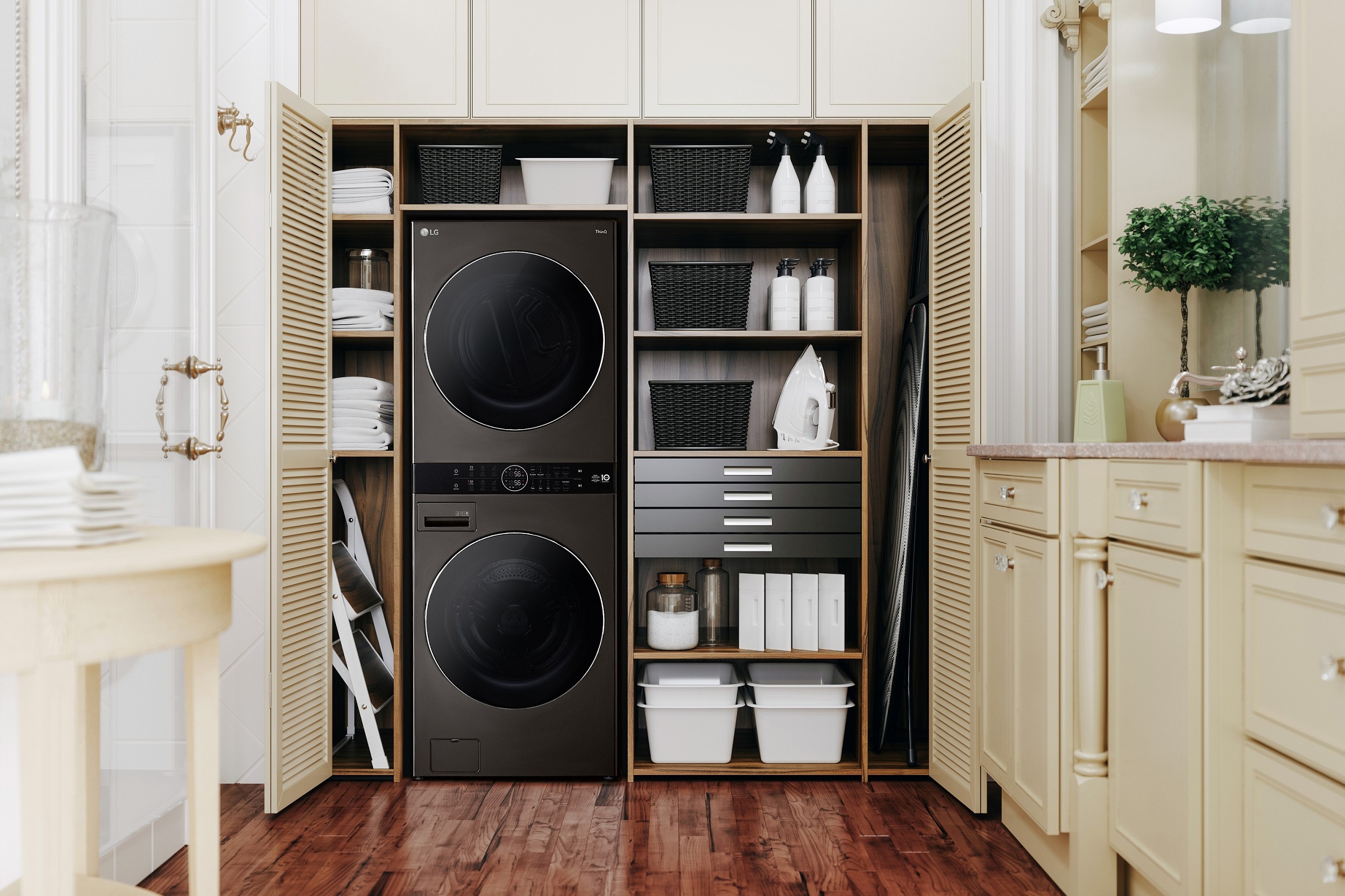 LG WashTower with Black Steel finish fitted inside a bright laundry room, delivering a minimalist and ultra-modern aesthetic.