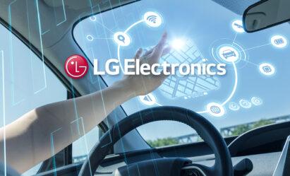 An illustration of a driver touching the screen of the vehicle with LG Electronics' logo overlapping