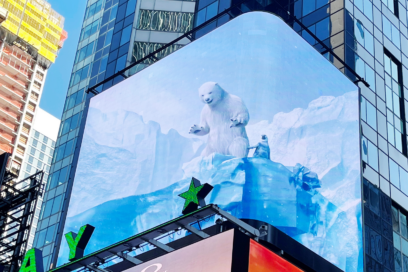LG's digital billboard in Time Square, New York displaying an illustration of a big polar bear