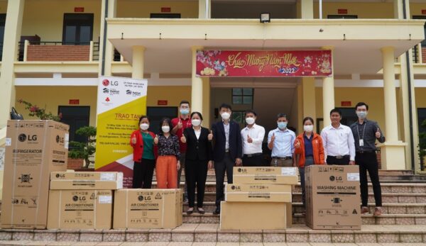 A photo taken at the project's opening ceremony with donated household appliances from LG