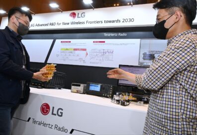 Visitors inspecting LG's 6G technology displayed at the IEEE International Conference on Communications (ICC) 2022