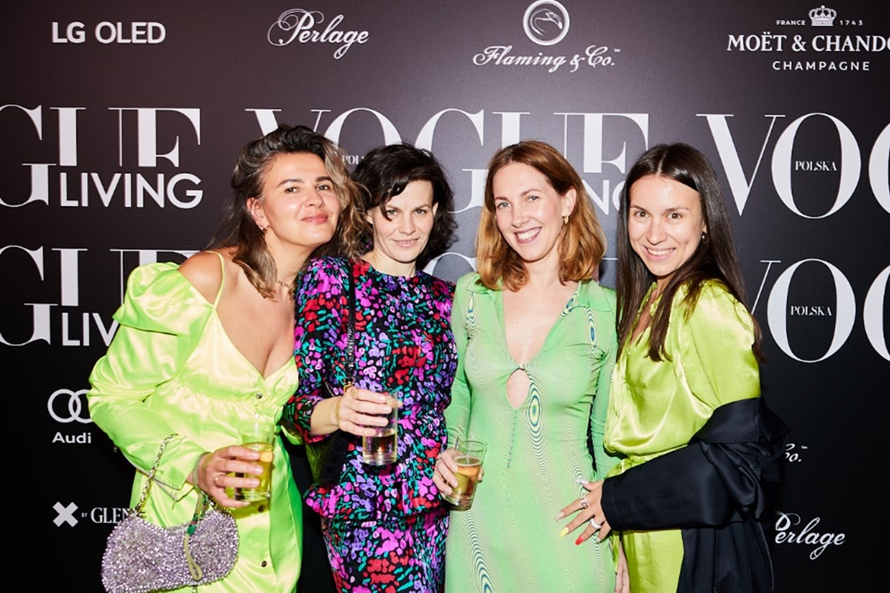 Four female celebrities are posing infront of a media wall prepared for the launch event of Polska Living