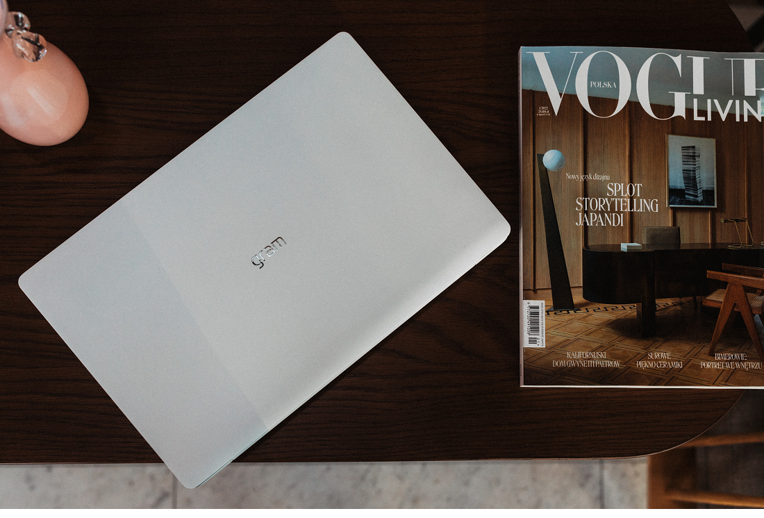 LG gram placed next to the first edition of Vogue Polska magazine