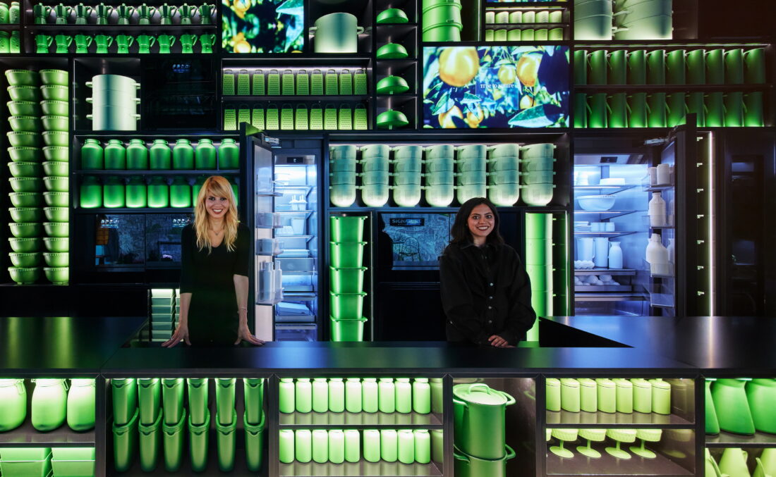 Staff standing beside the Signature Kitchen Suite refrigerators in the Signature Kitchen Suite showroom in Piazza Cavour, Milan, Italy