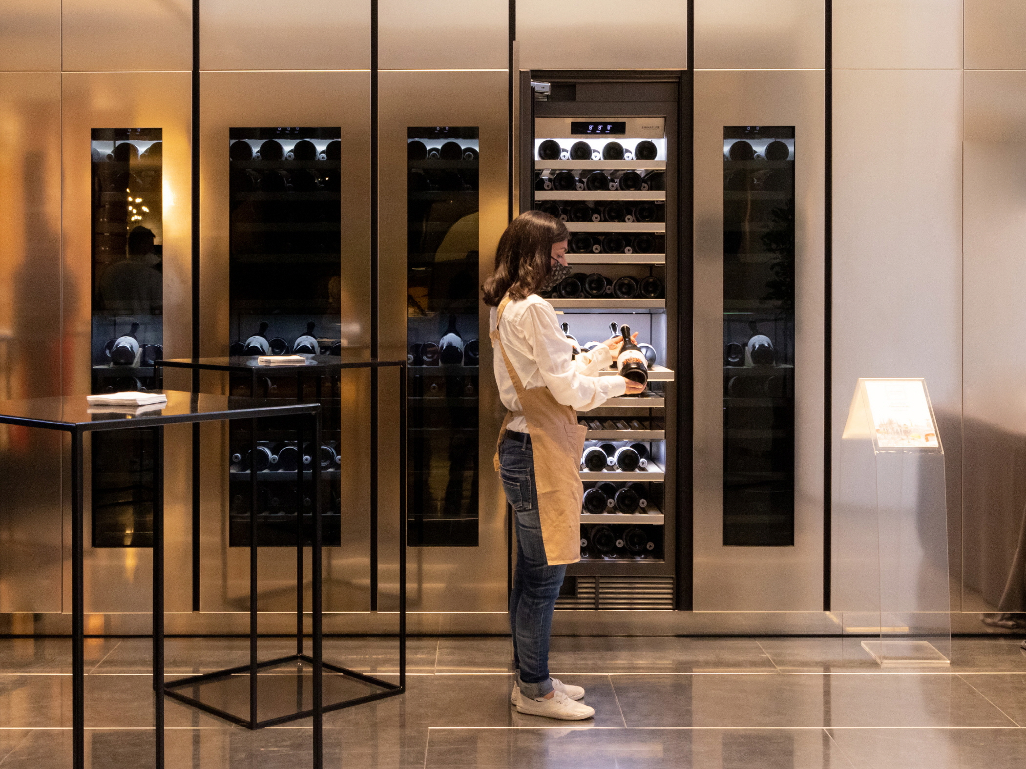 Signature Kitchen Suite 18-inch and 24-inch column wine cellars are showcased at the Signature Kitchen Suite showroom in Piazza Cavour, Milan, Italy