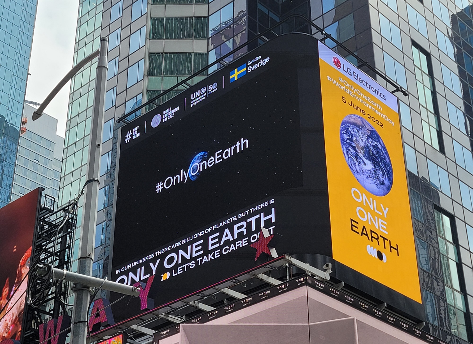 LG's digital billboard in Time Square, New York displaying a video of LG's Only One Earth campaign