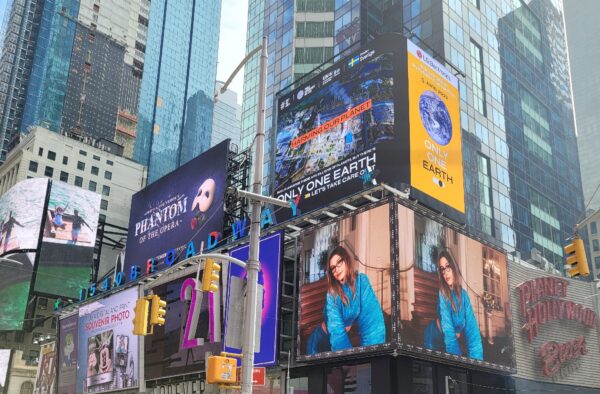 The overall view around LG's digital billboard in Time Square, New York displaying a video of LG's Only One Earth campaign 